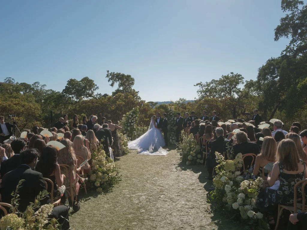 Bride and groom kiss in the aisle at a Montage Healdsburg wedding ceremony