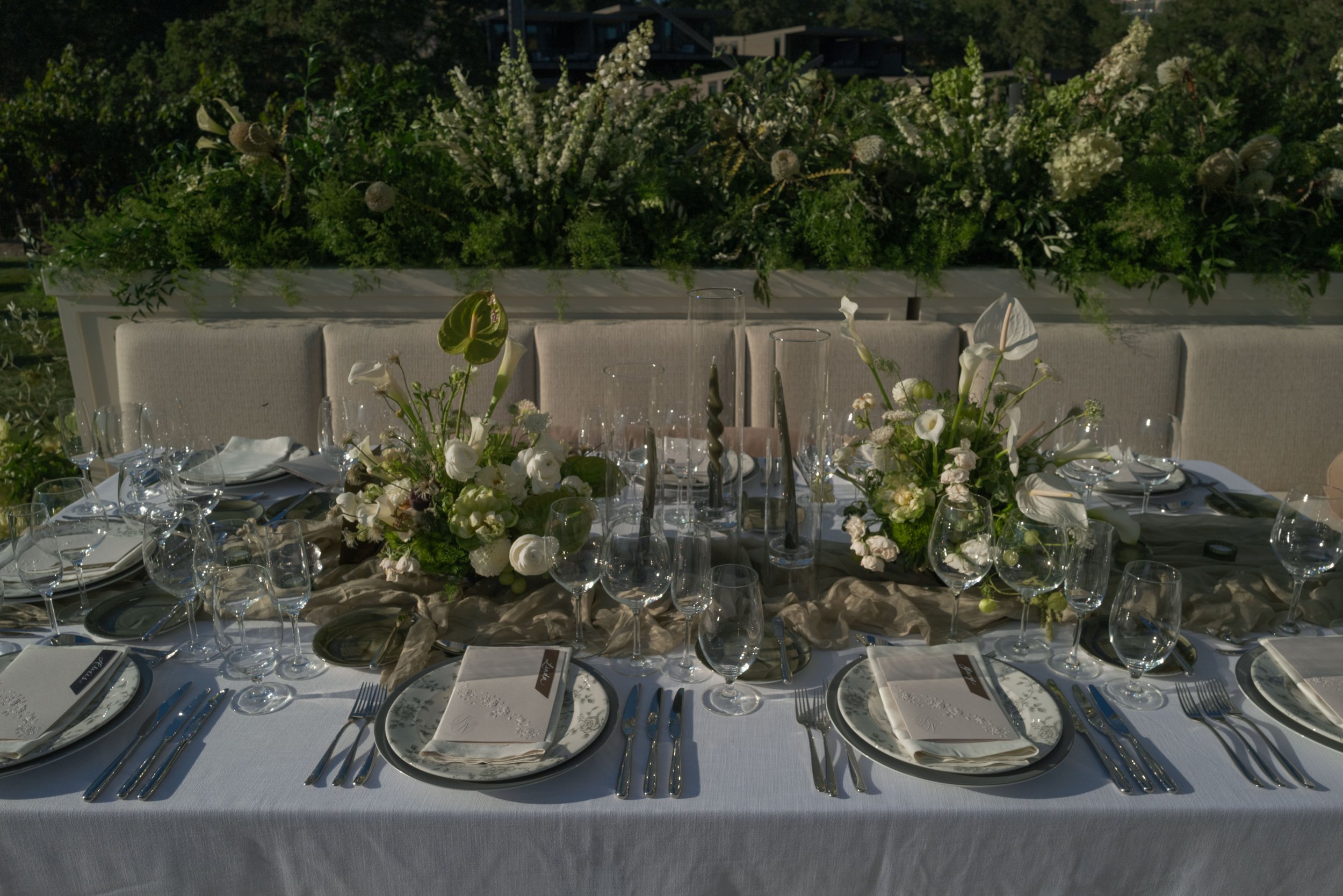 White and green wedding reception tablescape at Montage Healdsburg