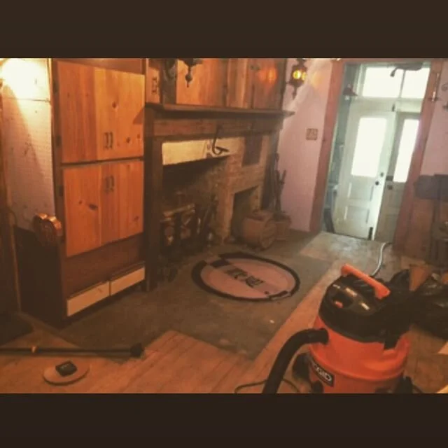 This kitchen was one of the first projects we tackled. After taking down terrible cabinetry we discovered this beautiful fireplace hidden in there. What a pleasant surprise. So we bit the bullet to rebuild the damaged brick and fixed the chimney. I w