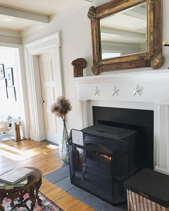 More fireplaces you guys. While I&rsquo;m on maternity leave I finally have time to dig up old photos. @carolasager dressed up this fireplace with some simple trim and @renovationhusbands provided the inspiration for the tile to cover up that ugly lo