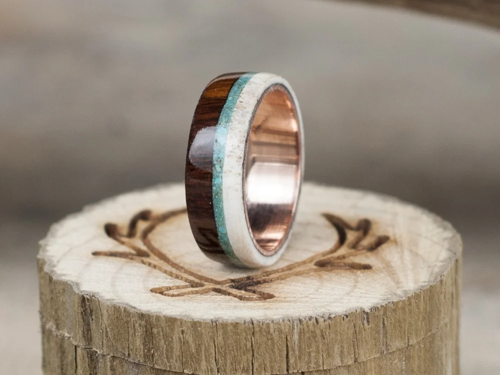 Rose gold lined wedding band with ironwood, elk antler & turquoise overlays.