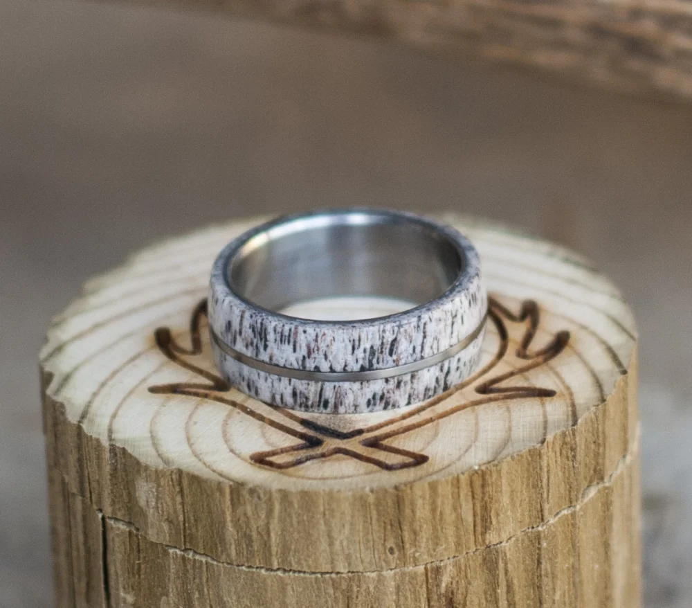 One of a kind men's wedding band featuring elk antler.
