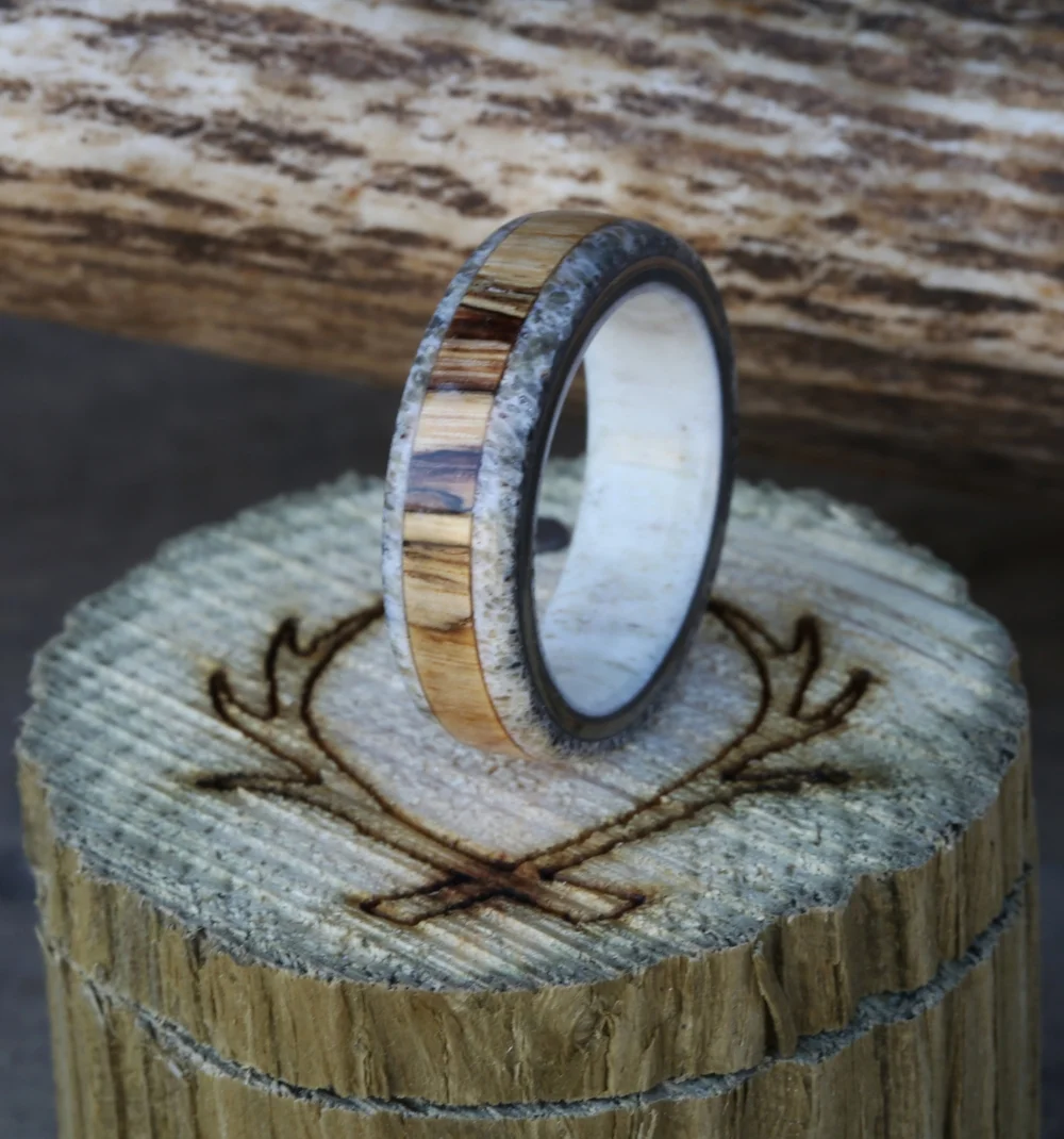 Men's antler wedding band with spalted maple inlay. Handcrafted by Staghead Designs.