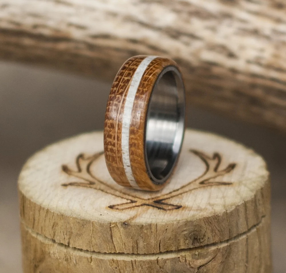 Copy of Whiskey barrel wood wedding ring with elk antler inlay.
