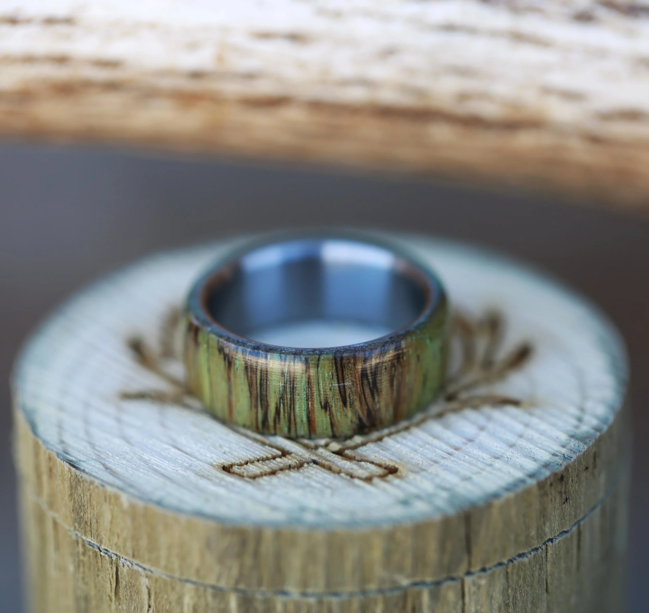 Green Spalted Maple Wedding Band for Men. Handcrafted by Staghead Designs.