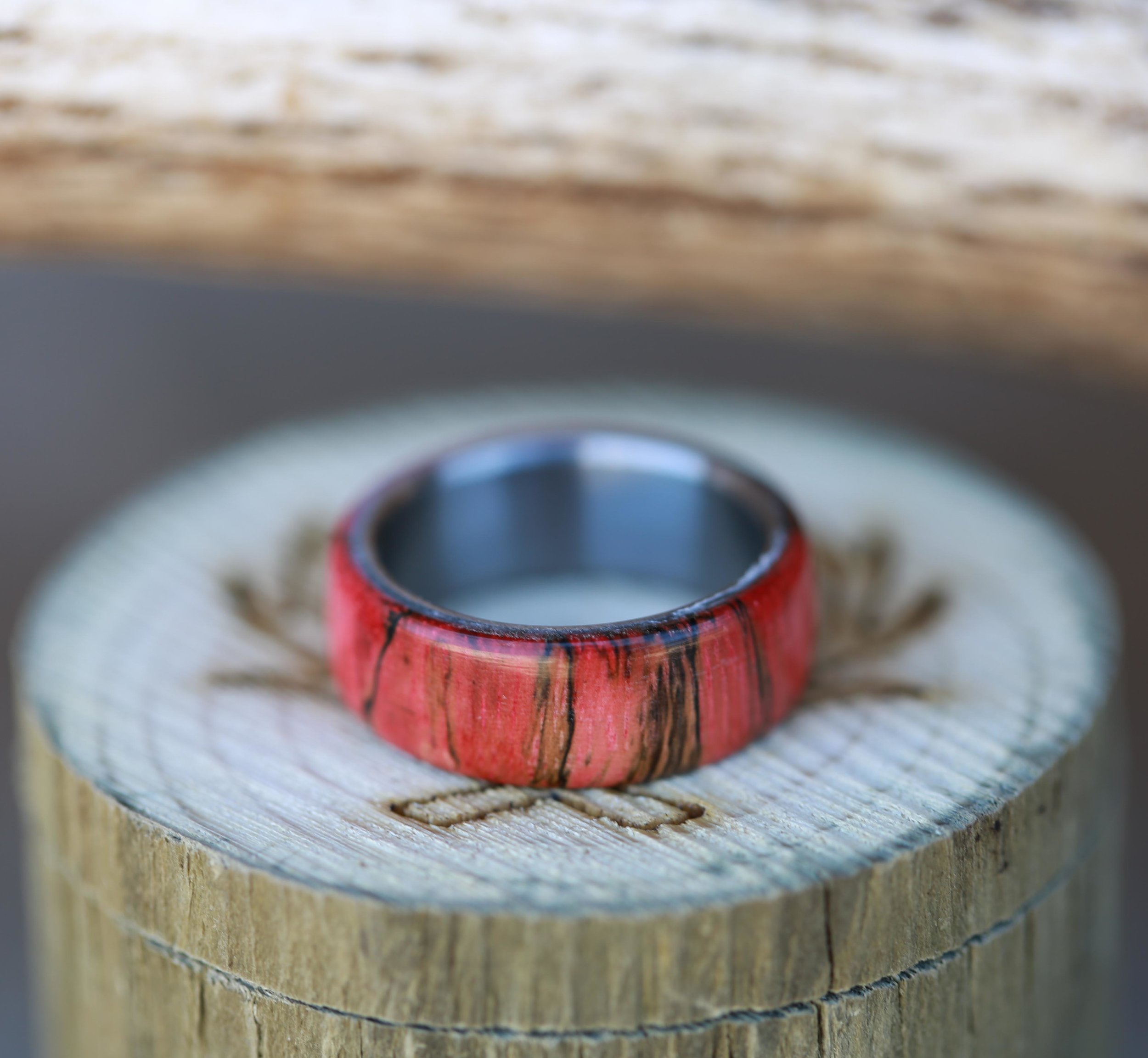 Men's Wedding Band with Red Spalted Maple Wood. Handcrafted by Staghead Designs.