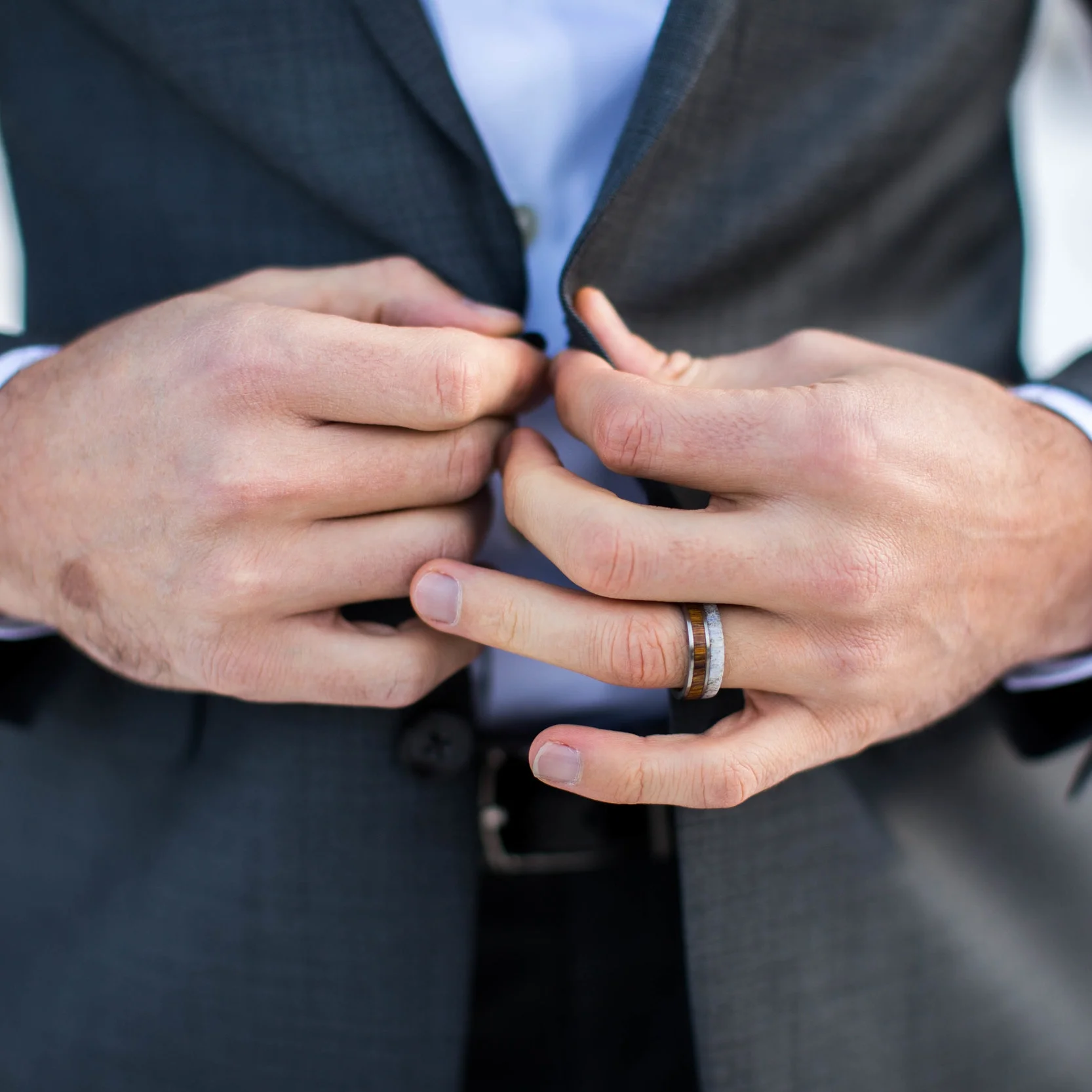 Men's Wood & Antler Wedding Band by Staghead Designs. Photo by Rebecca Mackenzie Photography.