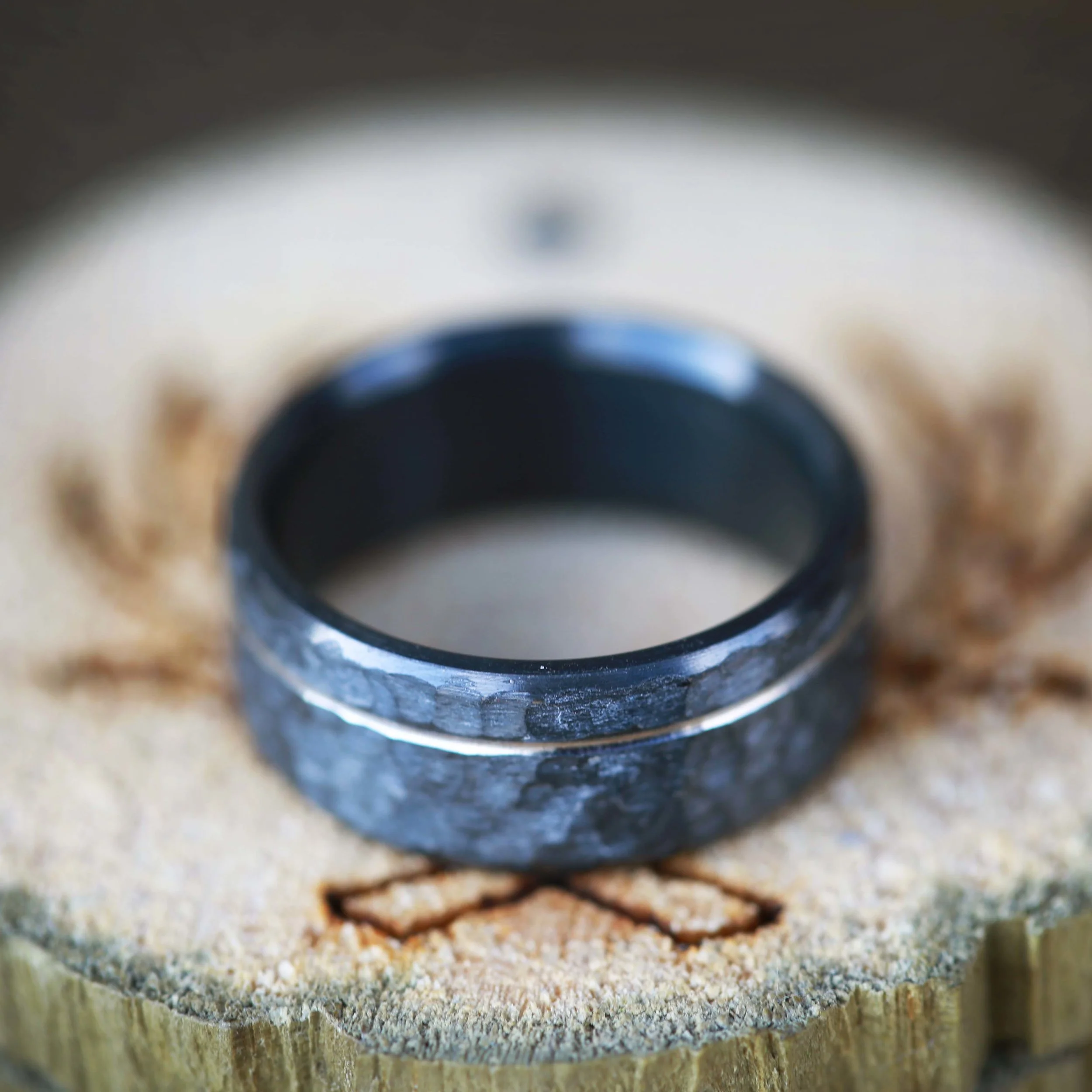Hand Turned and Fire-Treated Black Zirconium Wedding Band for Men. Handcrafted by Staghead Designs.
