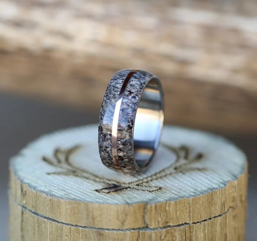 Handcrafted wedding ring with elk antler inlay.