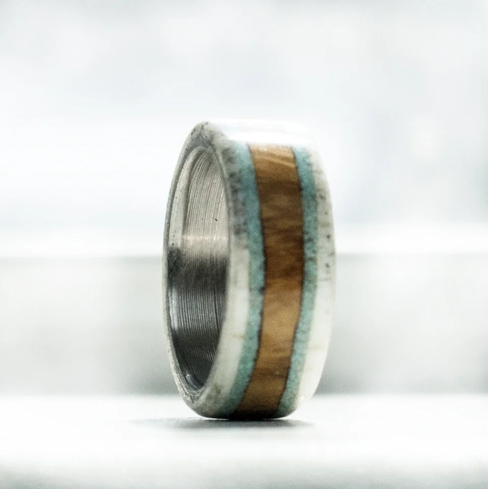 three piece ironwood and antler with two turquoise inlays.jpg