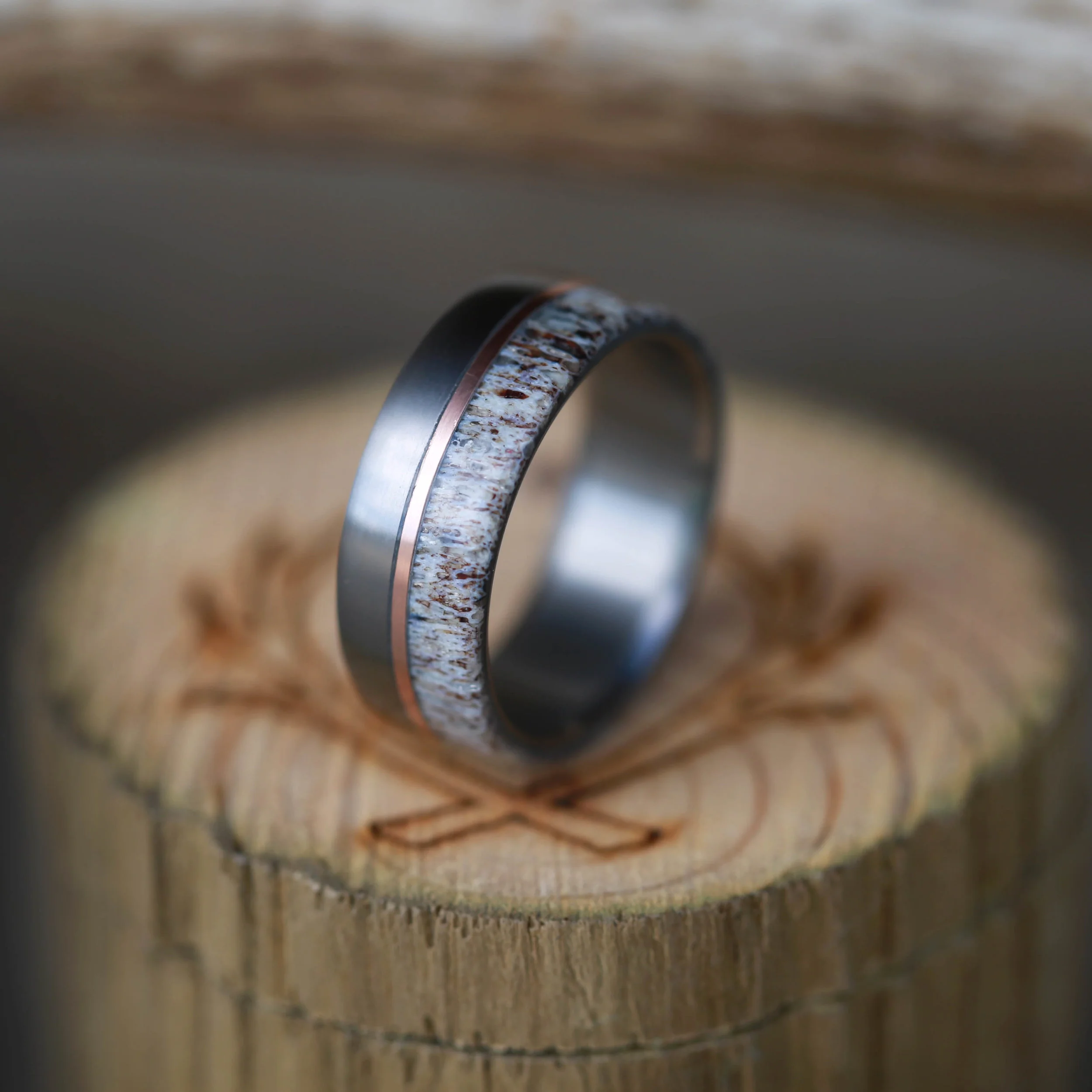 Custom Wedding Ring with Antler and Rose Gold. Handcrafted by Staghead Designs.