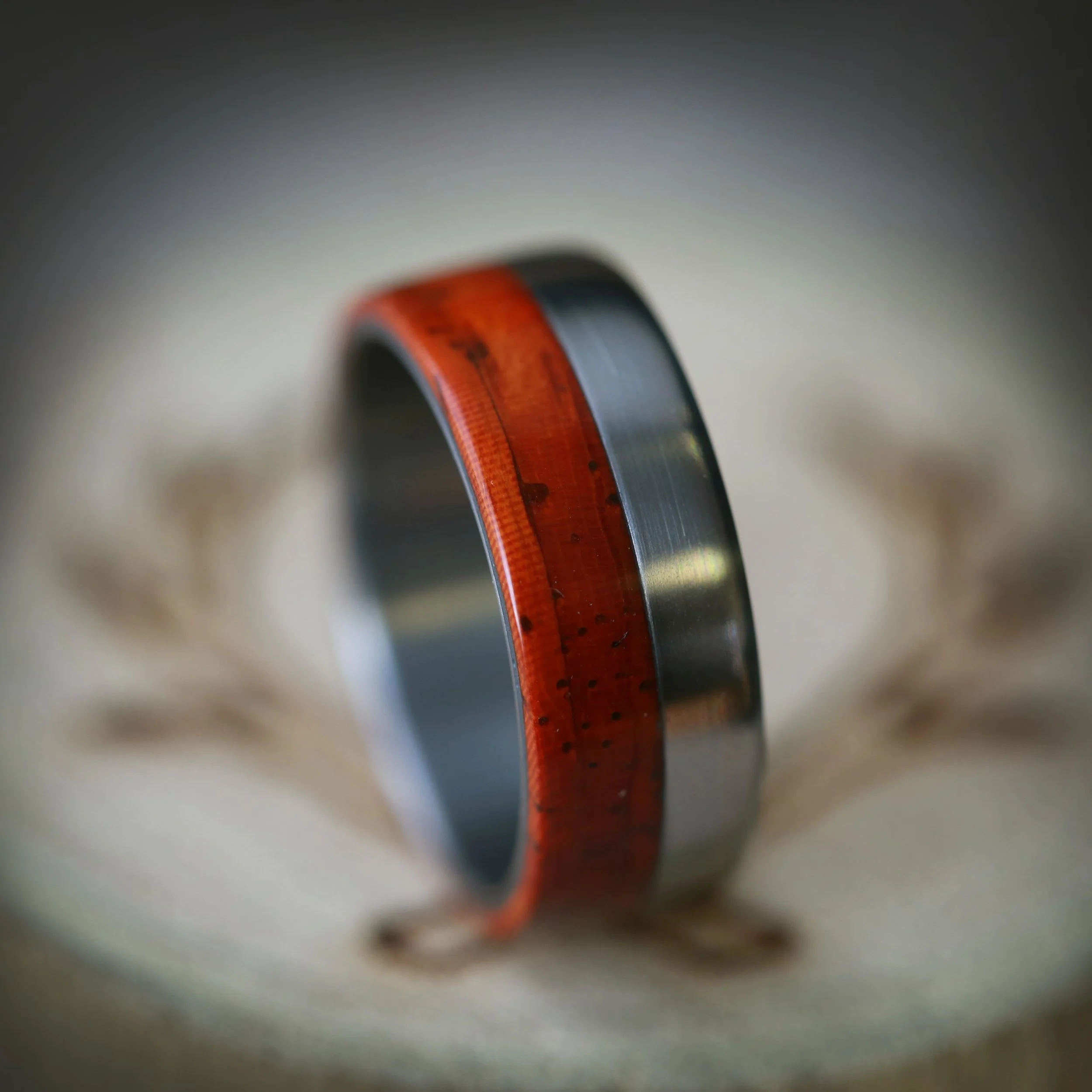 Custom Men's Wedding Ring with Red Wood. Handcrafted by Staghead Designs.