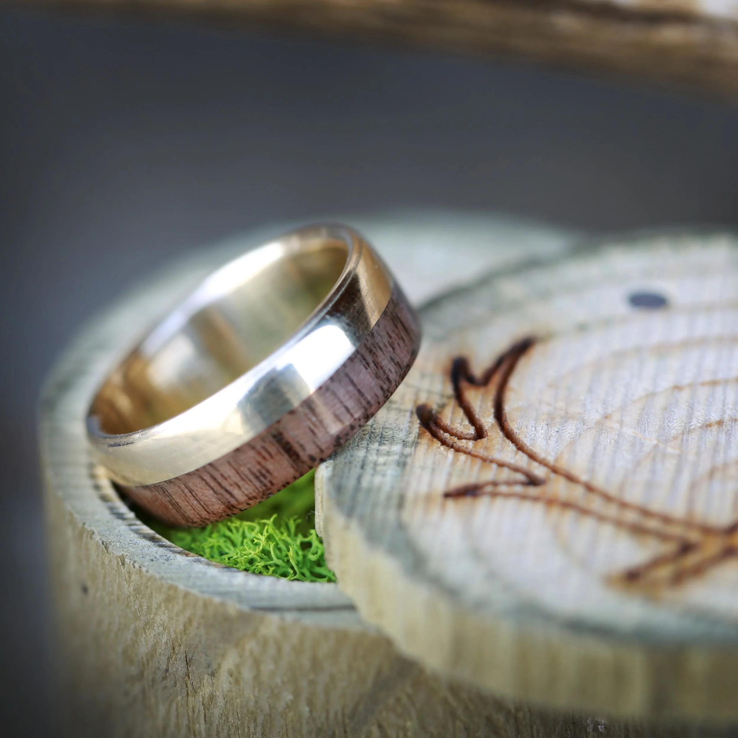 Yellow Gold and Black Walnut Wood Wedding Ring. Handcrafted by Staghead Designs.