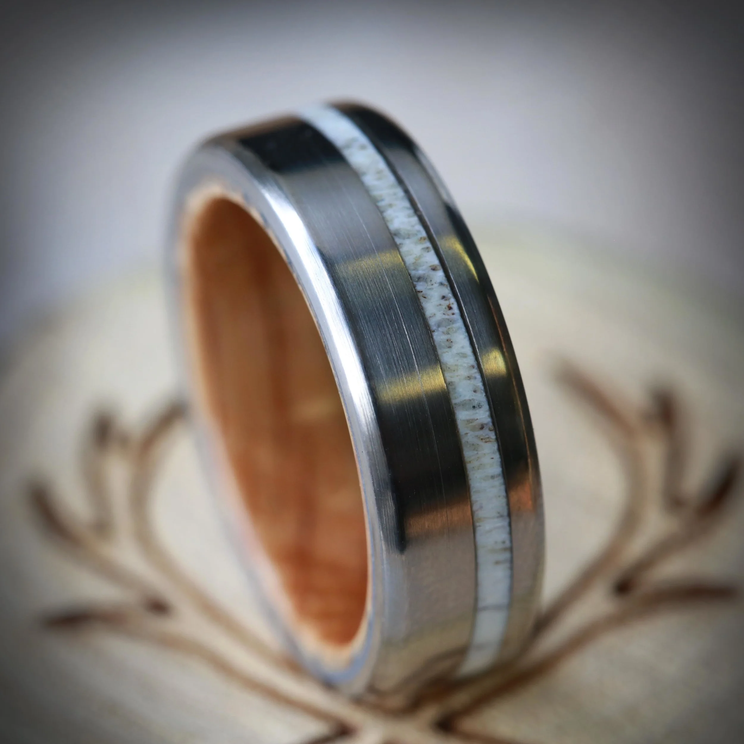 Antler Wedding Ring with Whiskey Barrel Wood Lining. Handcrafted by Staghead Designs.