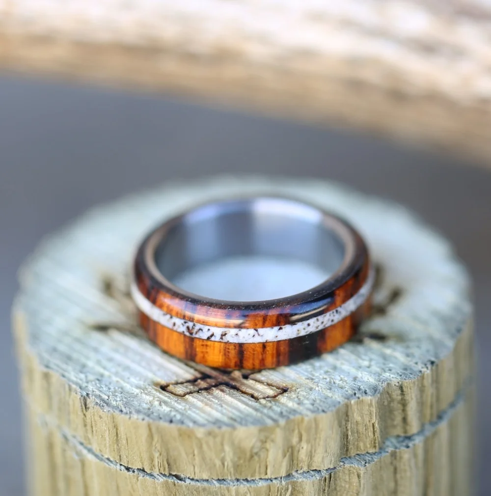 Wood wedding band w/ elk antler inlay. Handcrafted by Staghead Designs.