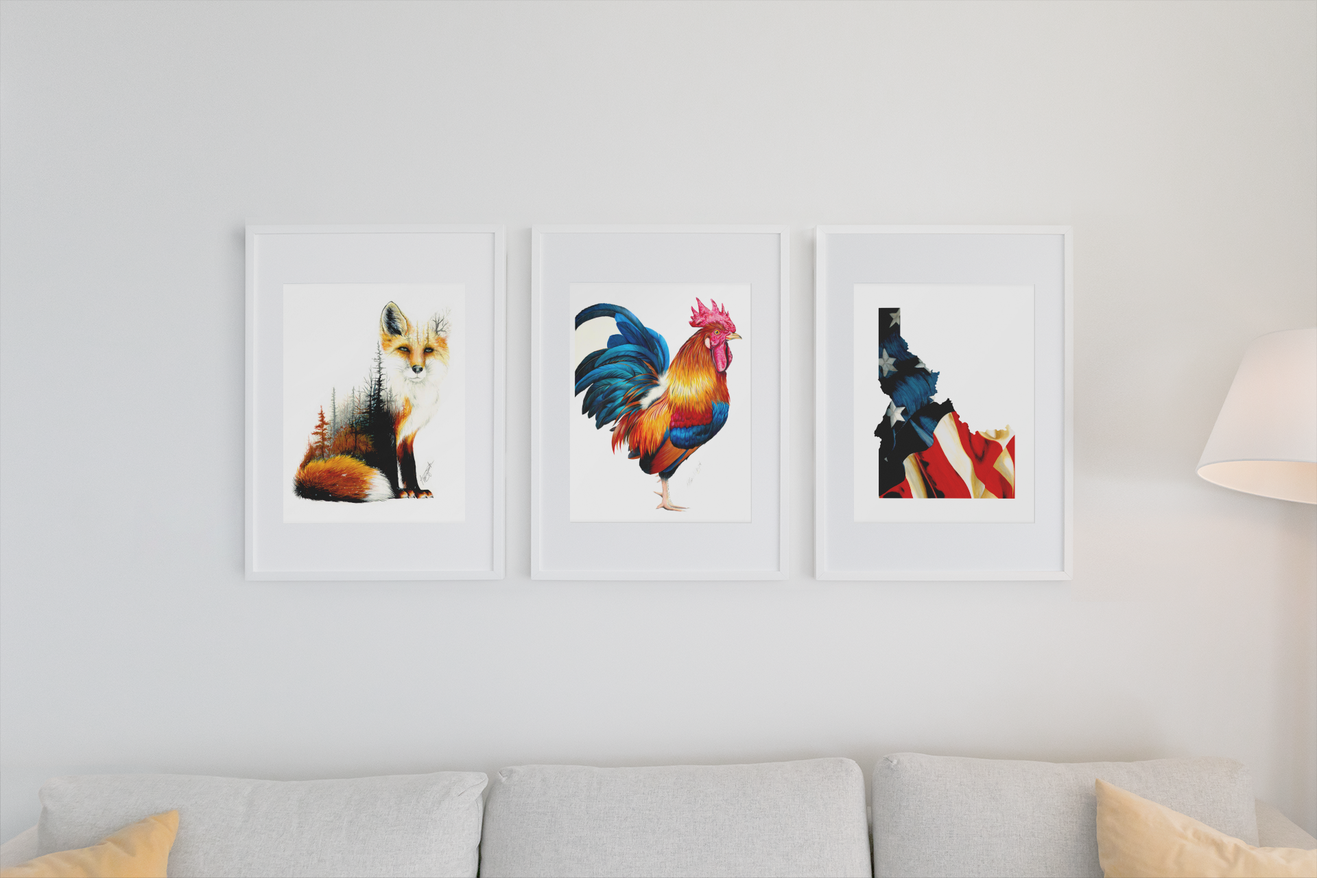 set of three white frames hanging over couch, fox art print, rooster art print, american flag art print