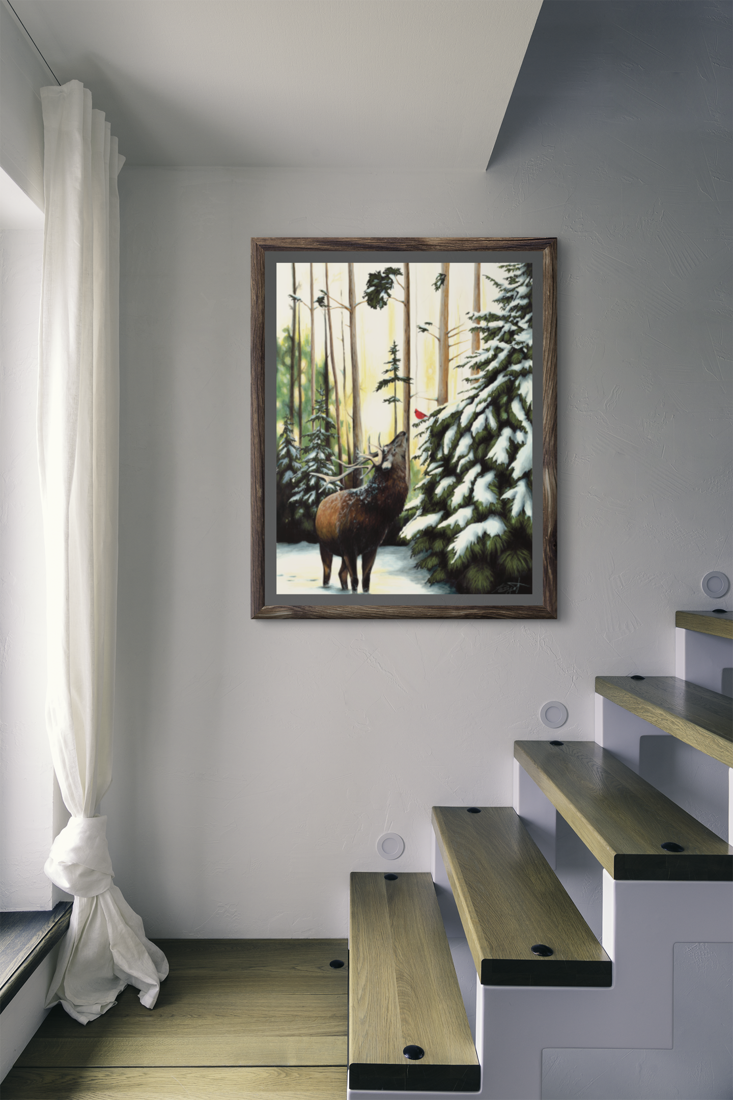elk and cardinal in the snow, snowy forest in the winter art print in brown frame hanging over staircase