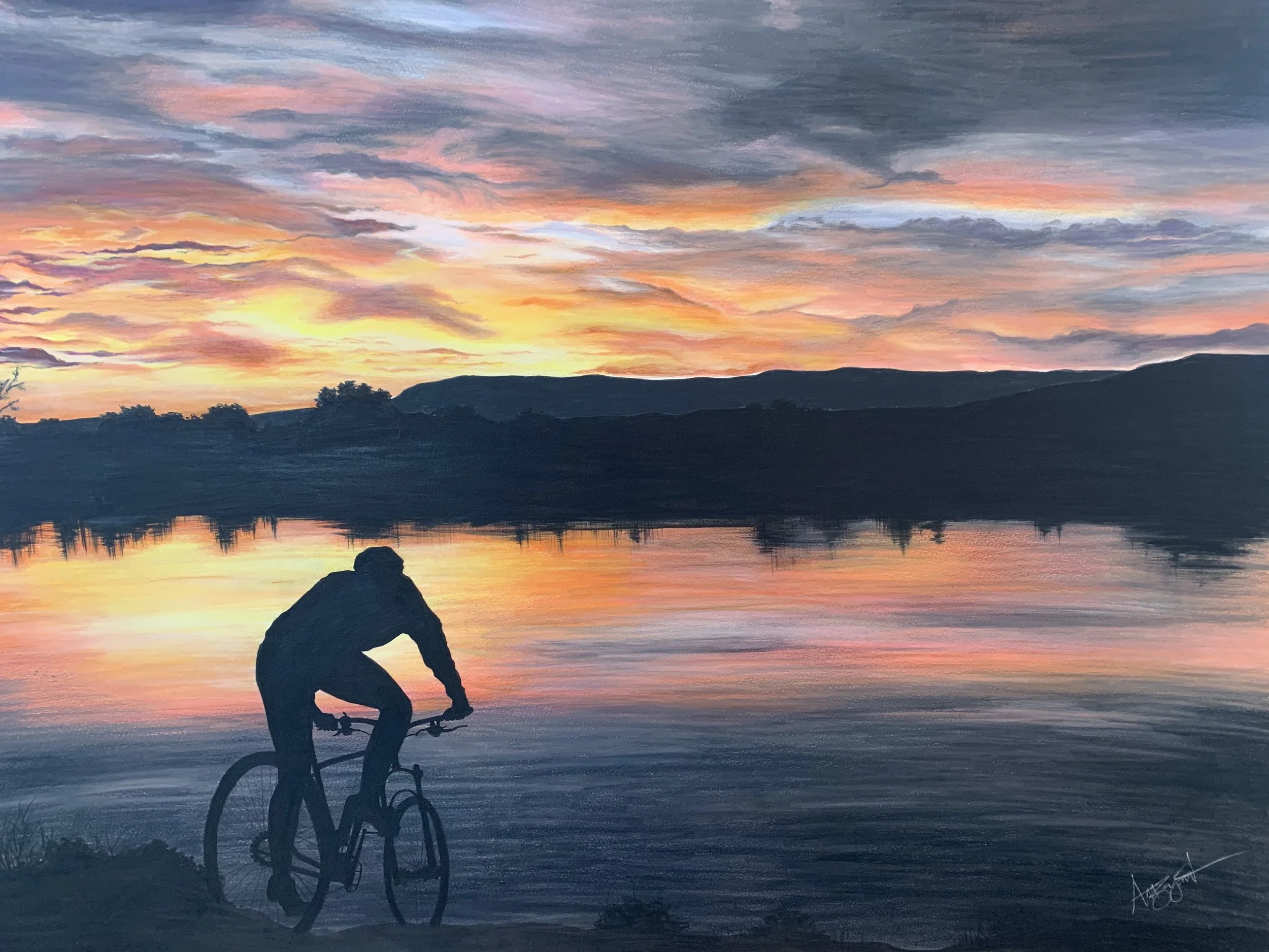 Bicyclist on the river