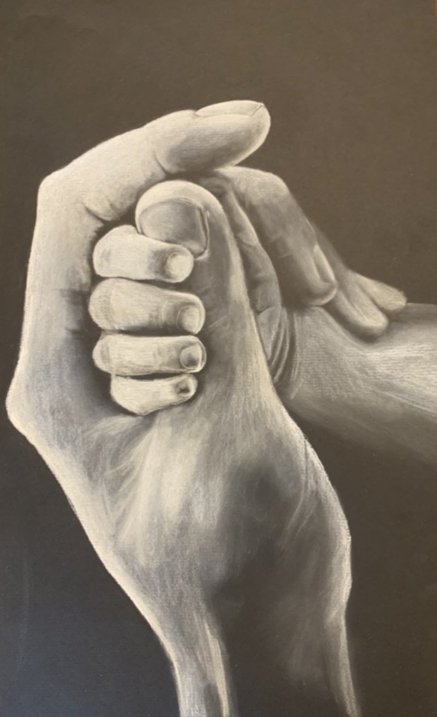 Father's hand and baby's hand