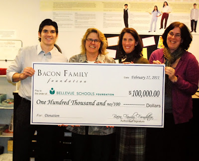 Tony Bacon from The Bacon Family Foundation presents a check to Roxanne Shepherd, Dr. Tracy Maury & Marian McDermott from The Bellevue Schools Foundation.