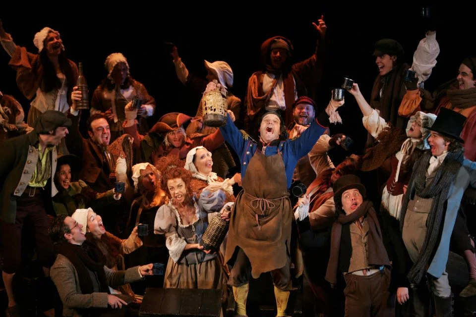 Master of the House from Les Miserables 3rd National Tour. I'm the guy in the top hat all the way to the right with the wide open mouth.