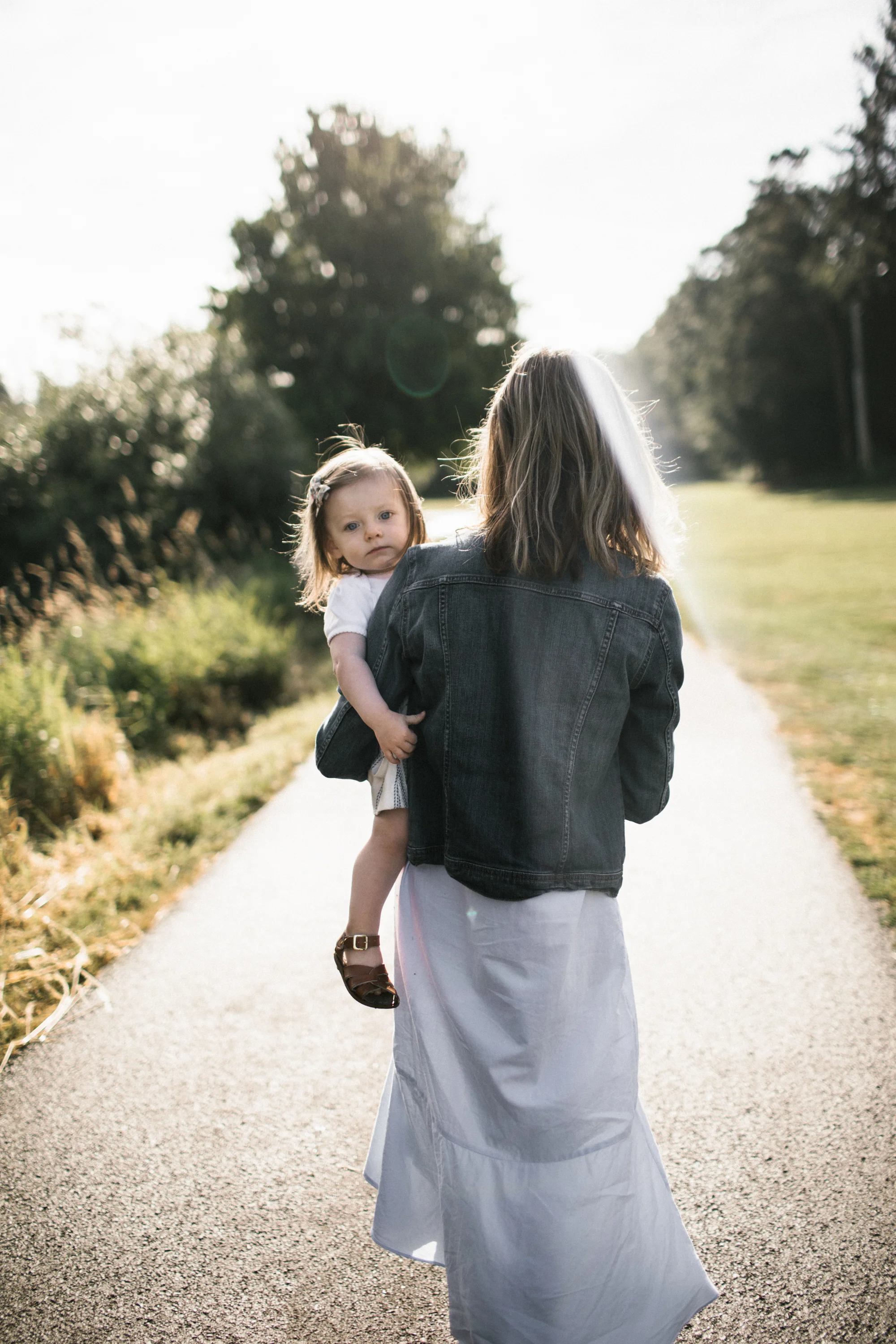 Mom walking with one year old