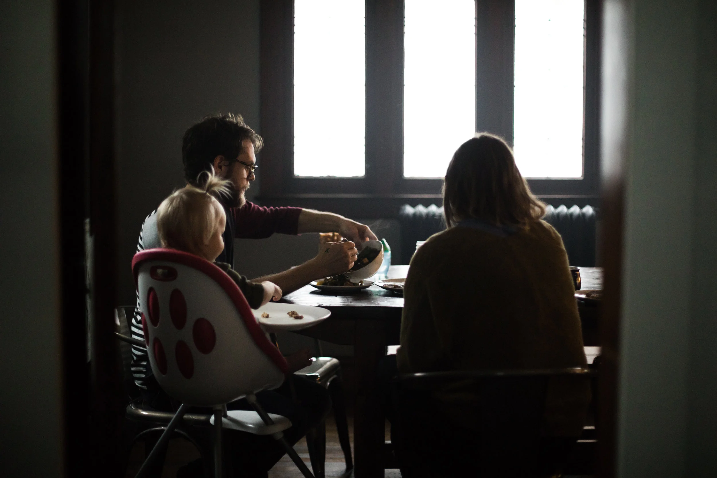 family eating at table together