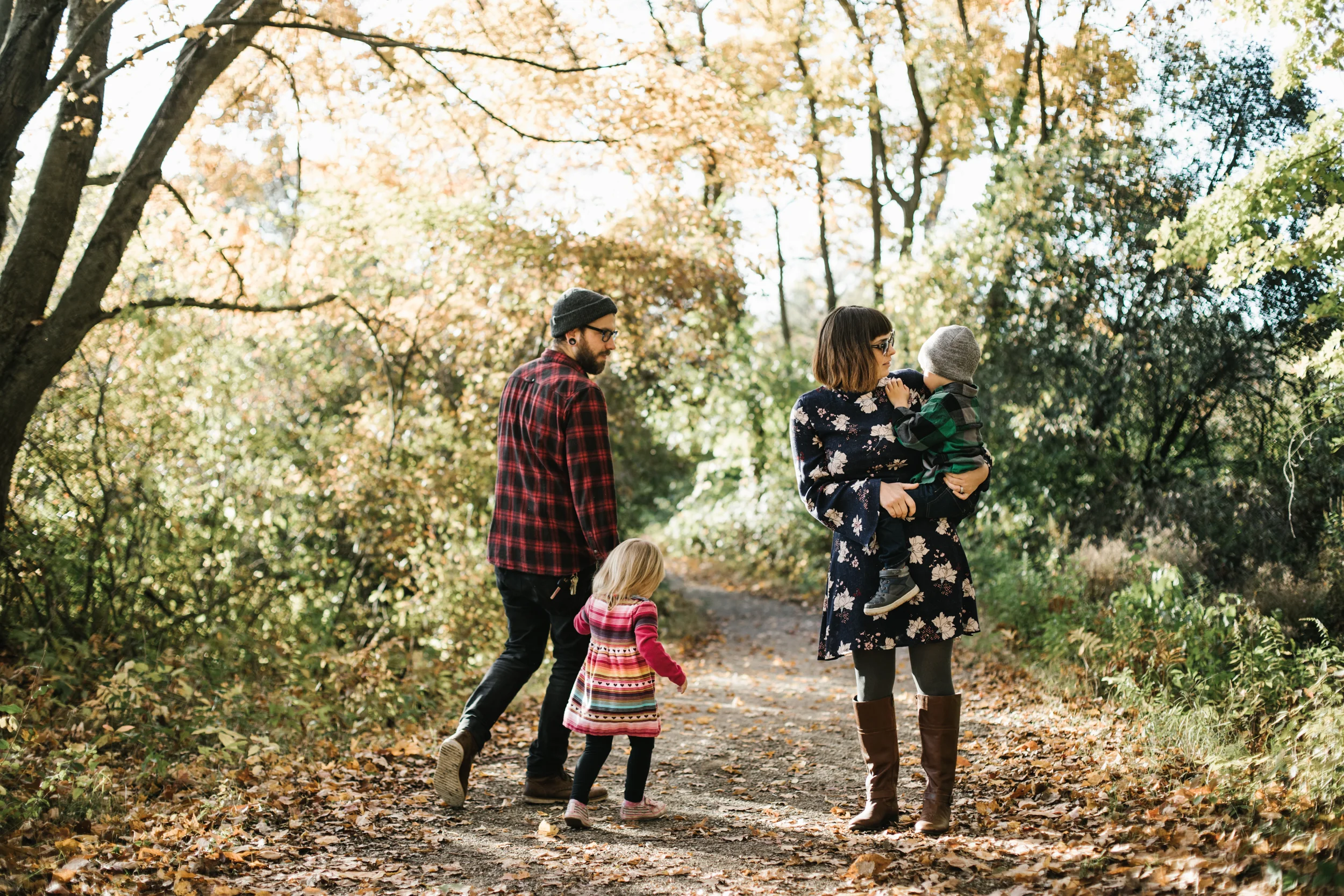 Family walking in woods