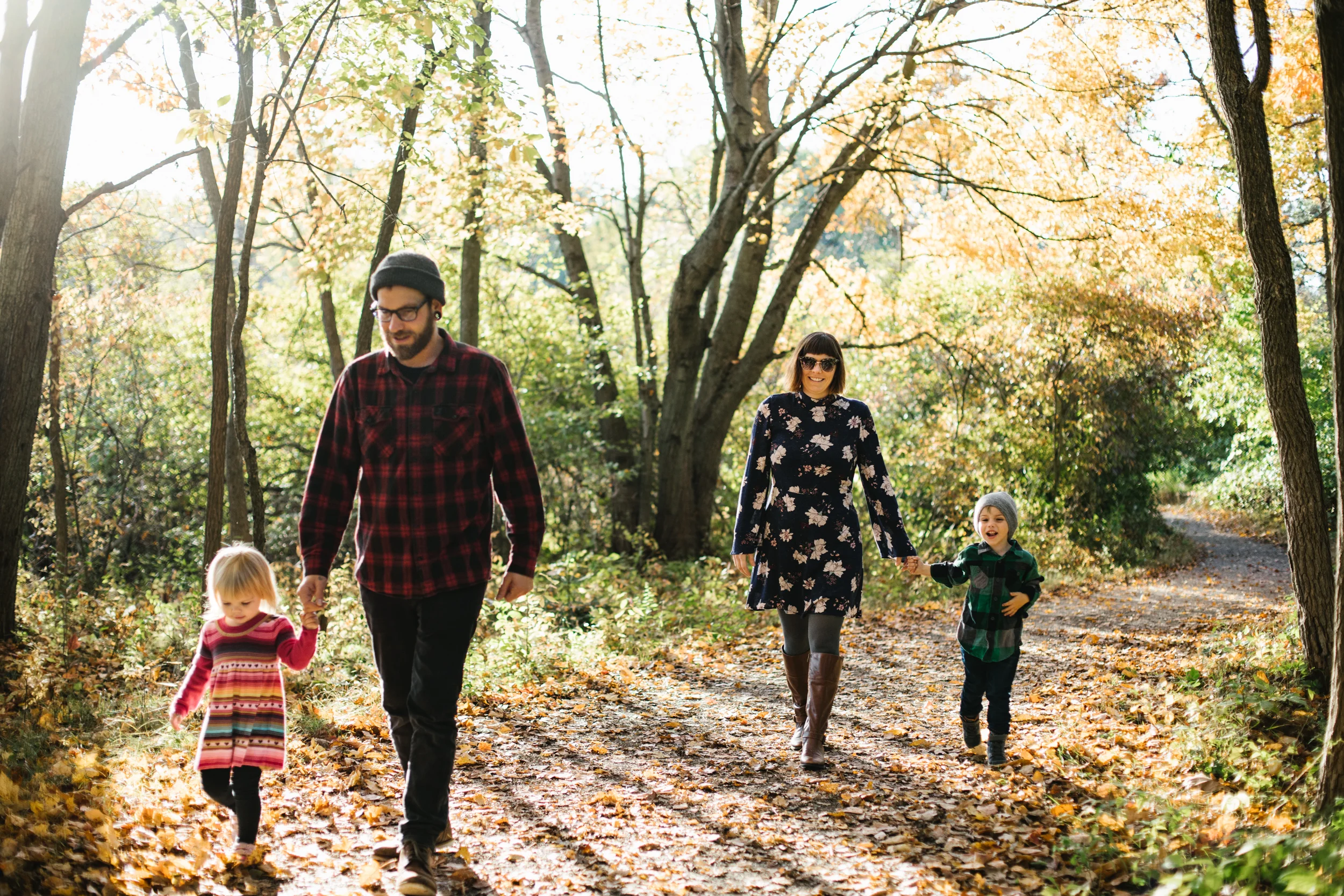Family walking in woods