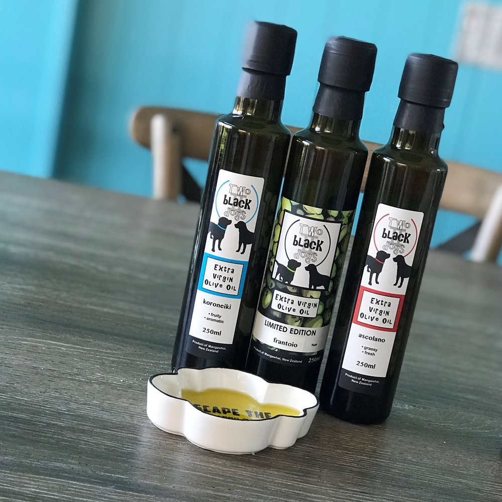 Two black dogs olive oil 1.jpeg
