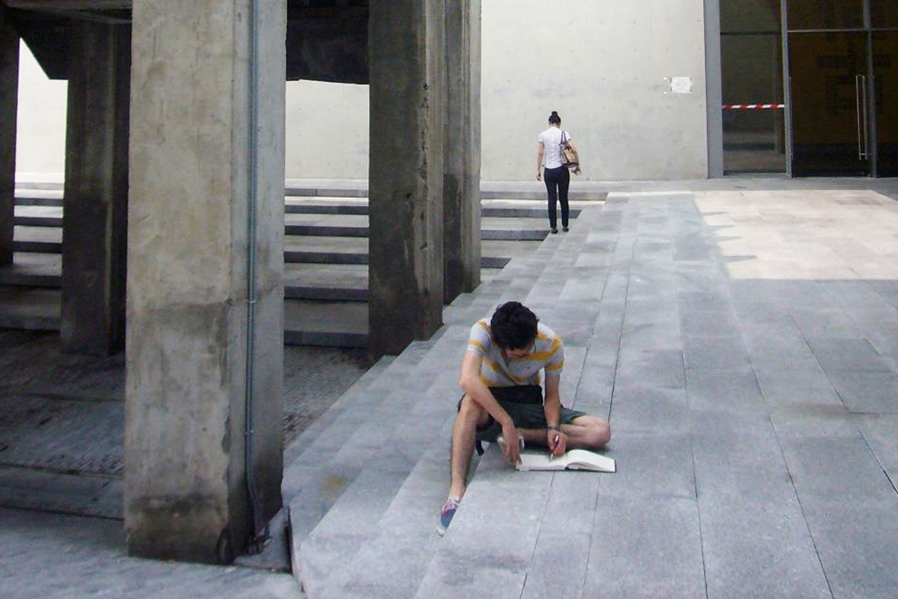 A student from the workshop sketches at the West Bund Museum from the Shanghai leg of the International Studio