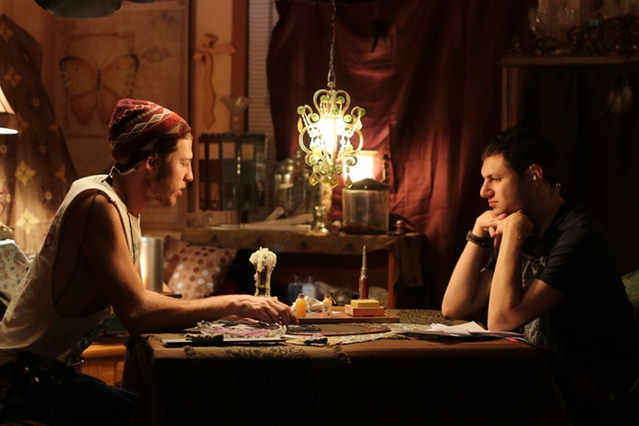 Production Designer, Jake, and 1st AD, Wes, stand in for camera in the Mystic Shop.