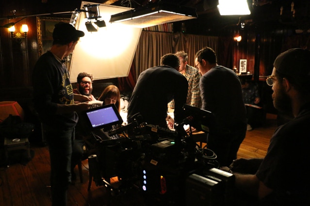 Everyone seriously preparing for a scene, except Steve