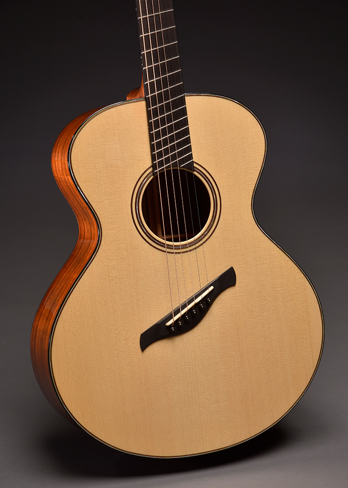 Model BK Fan Fret: Scale length 27" bass, 25.375" treble with 5th fret perpendicular. German Spruce top