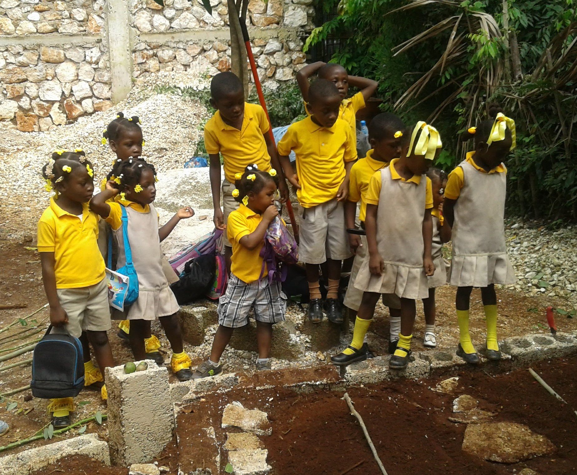 The Children Help Plant The Gardens That will One Day Help Provide School Lunch