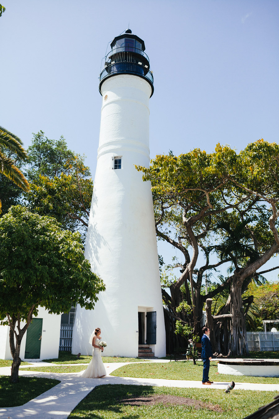 bride and groom first look at the lighthouse in key west florida wedding photographer destination weddings