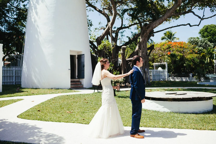 bride and groom first look at the lighthouse in key west florida wedding photographer destination weddings