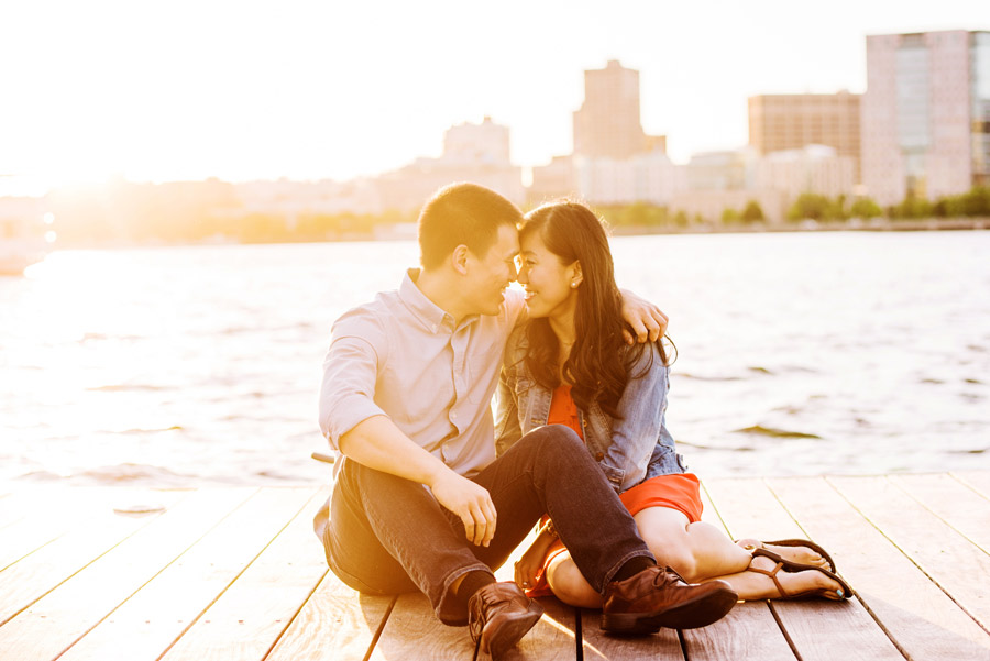  asian couple on the dock at the charles river esplanade on their engagement session 