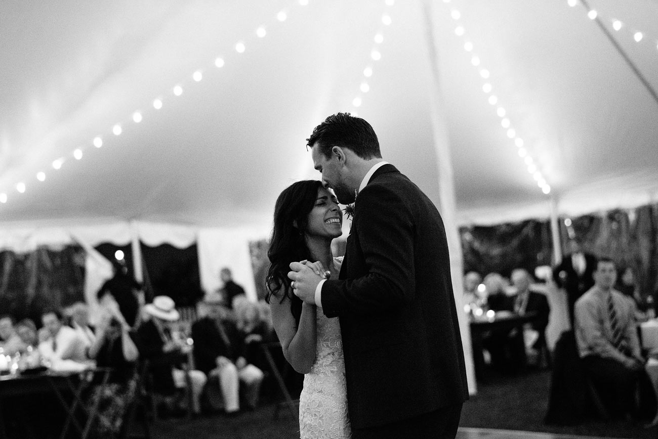 bride and groom first dance at the eastern point yacht club in Gloucestor, MA in a tent