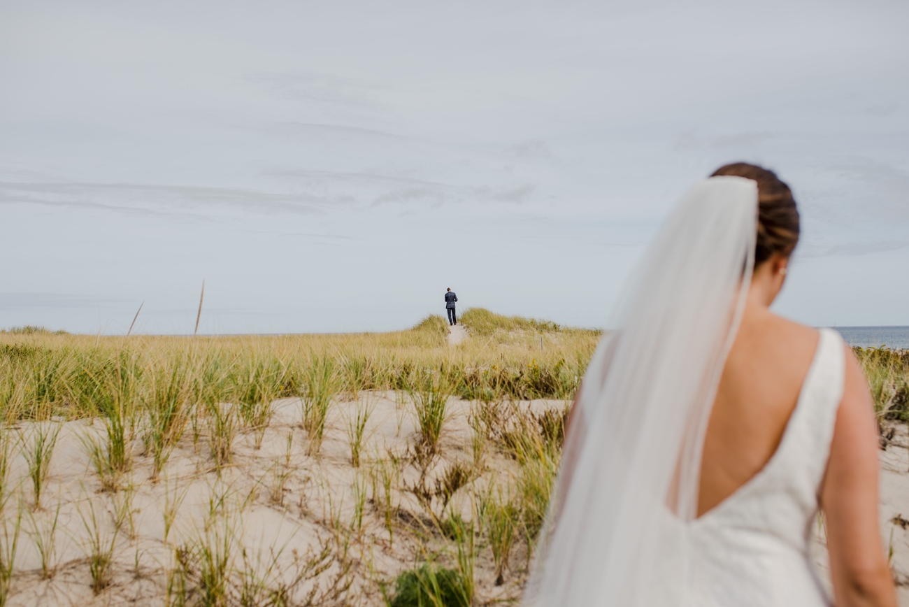 wedding first look in cape cod on the dunes