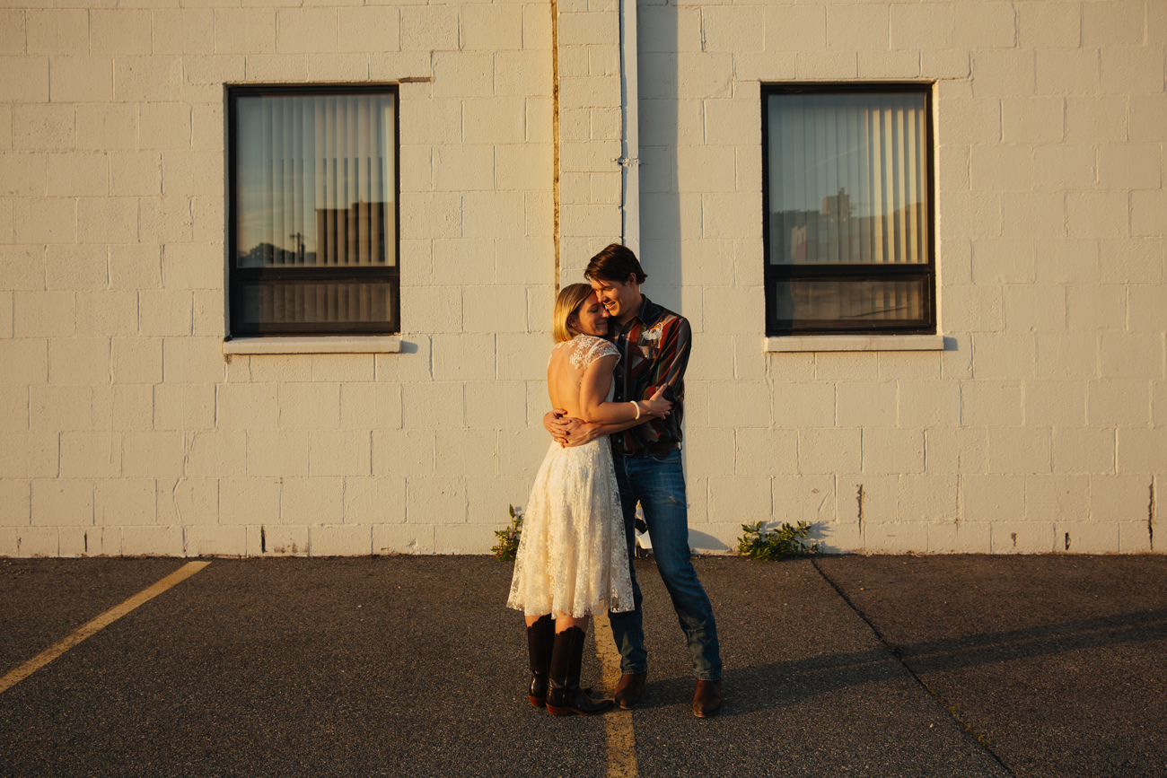 sunset urban modern photographers bride in creative wedding dress