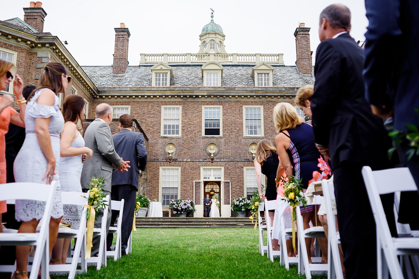 walking down the aisle at the crane estate in ipswich ma