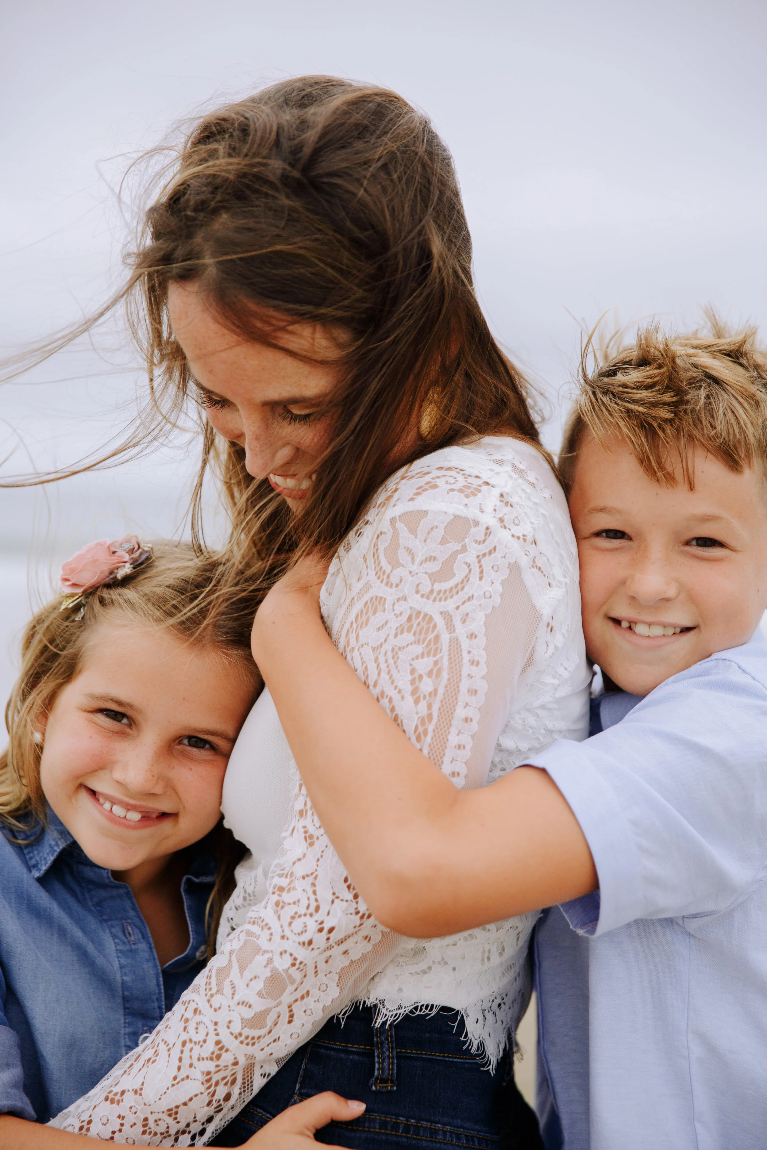  Cape Cod family photographer fun family photos with mom kids playing on the beach 