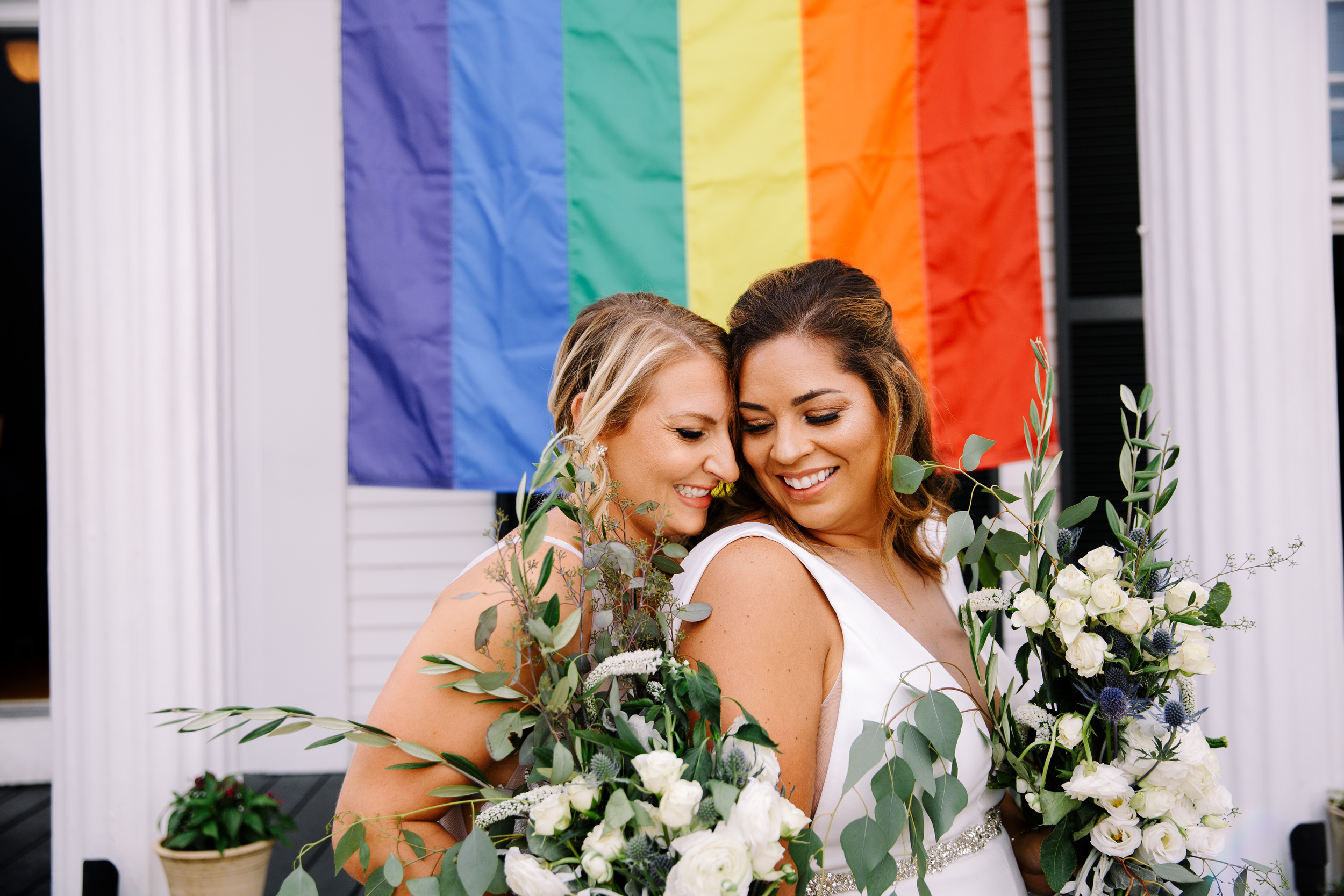 Strangers and Saints downtown provincetown intimate wedding venue and with lesbian same sex brides — Cape Cod and Boston area Wedding Photographer with photojournalistic style photo