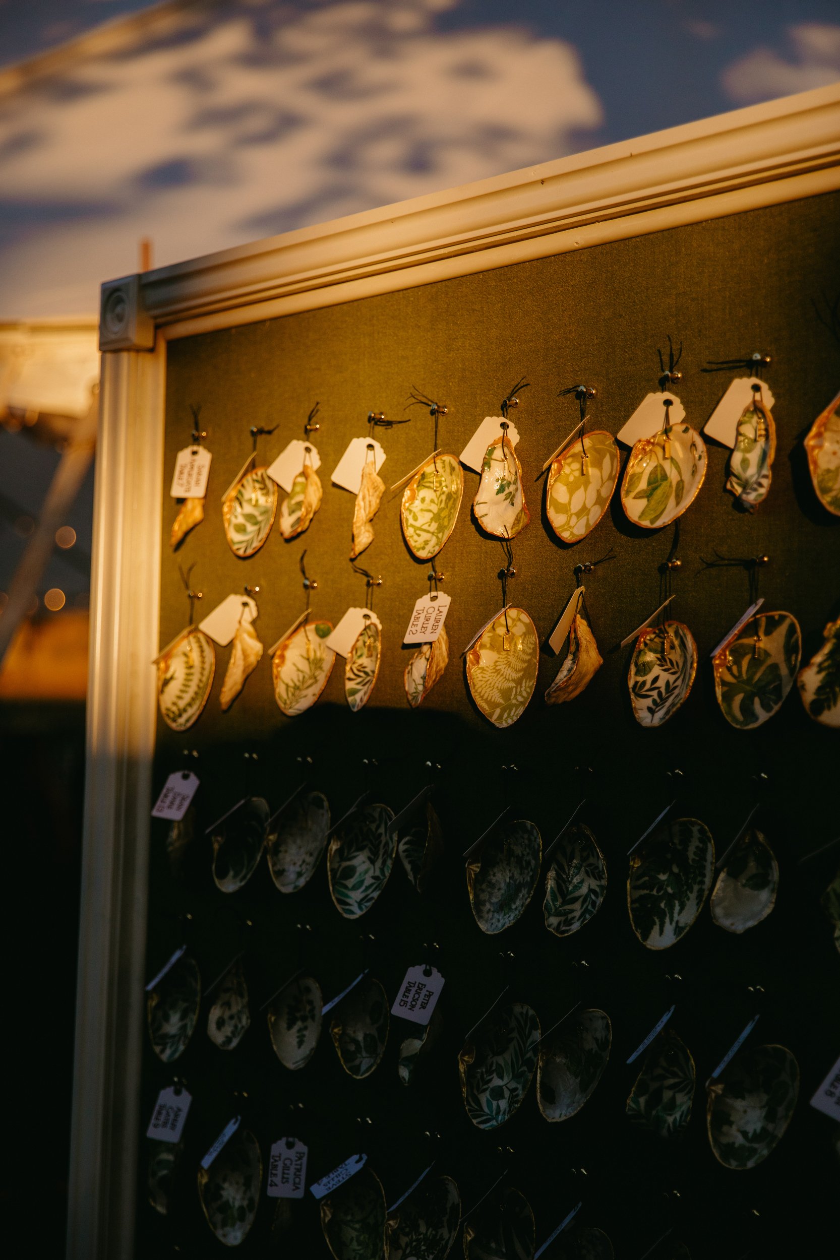 Glastonbury Abbey and Cohasett Golf Club Luxury tent wedding in early fall stylish bride and groom with oysters for placement cards and golden sunset vibes in an editorial documentary style