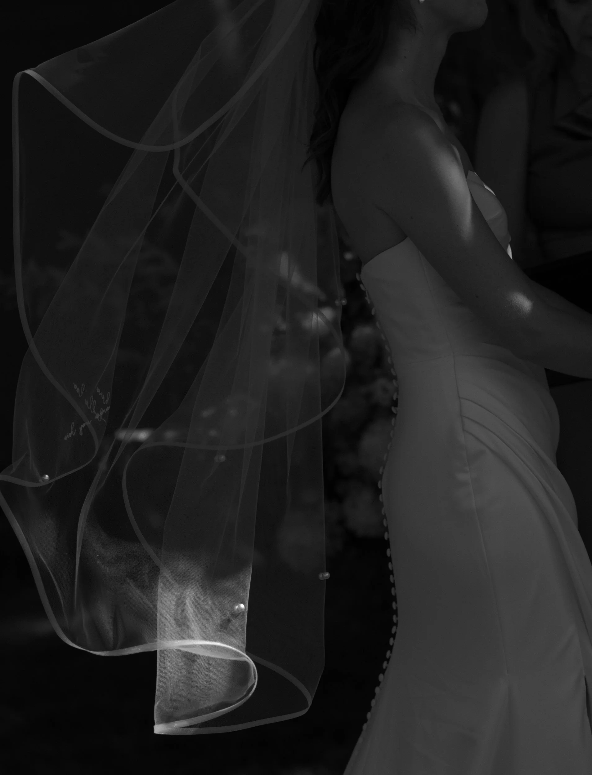 dramatic veil photo of bride at the ceremony outdoors in CT