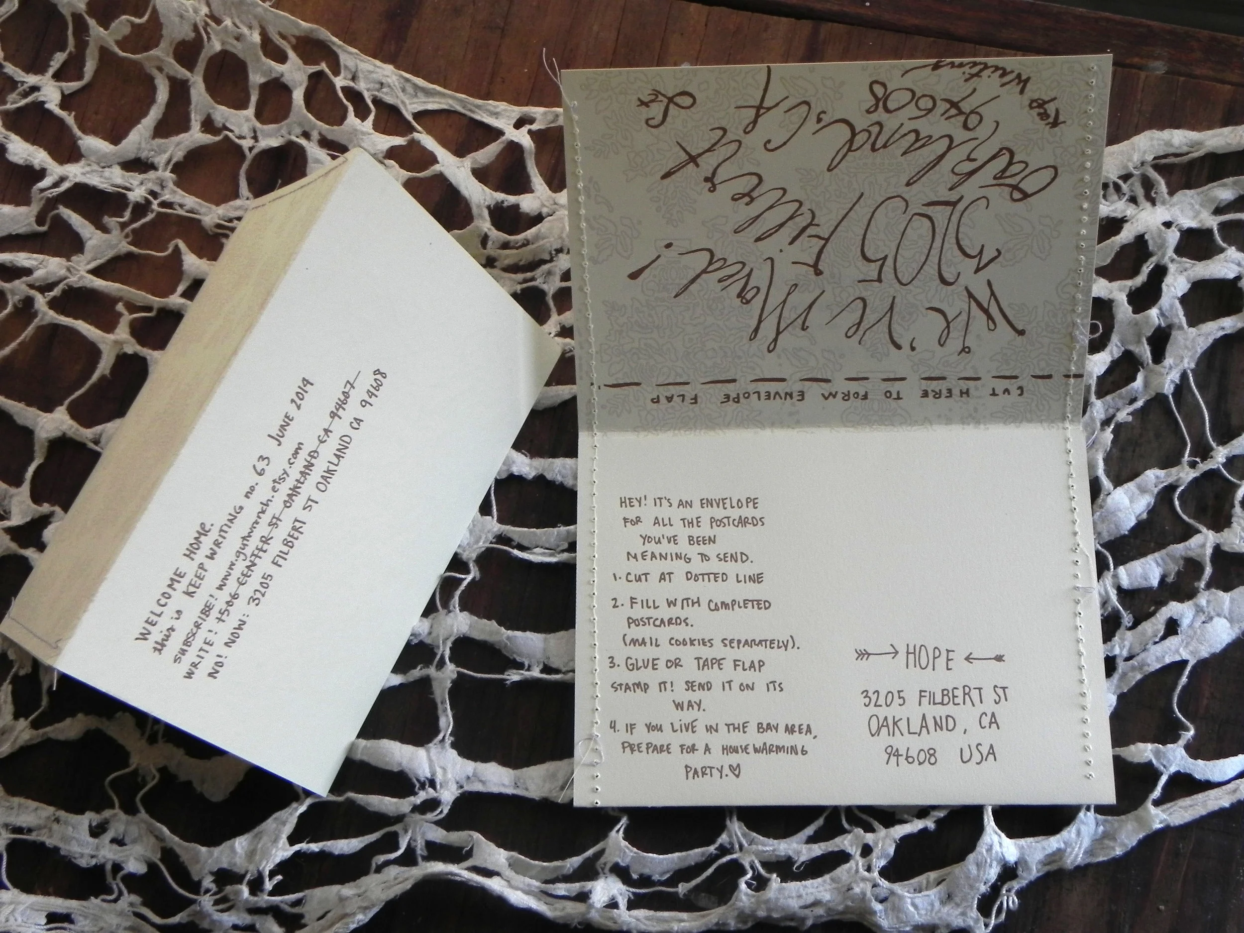 Keep Writing #63 June 2014 Copper and lilac letterpress print with sewn edges to form envelope and postcard with new mailing address.