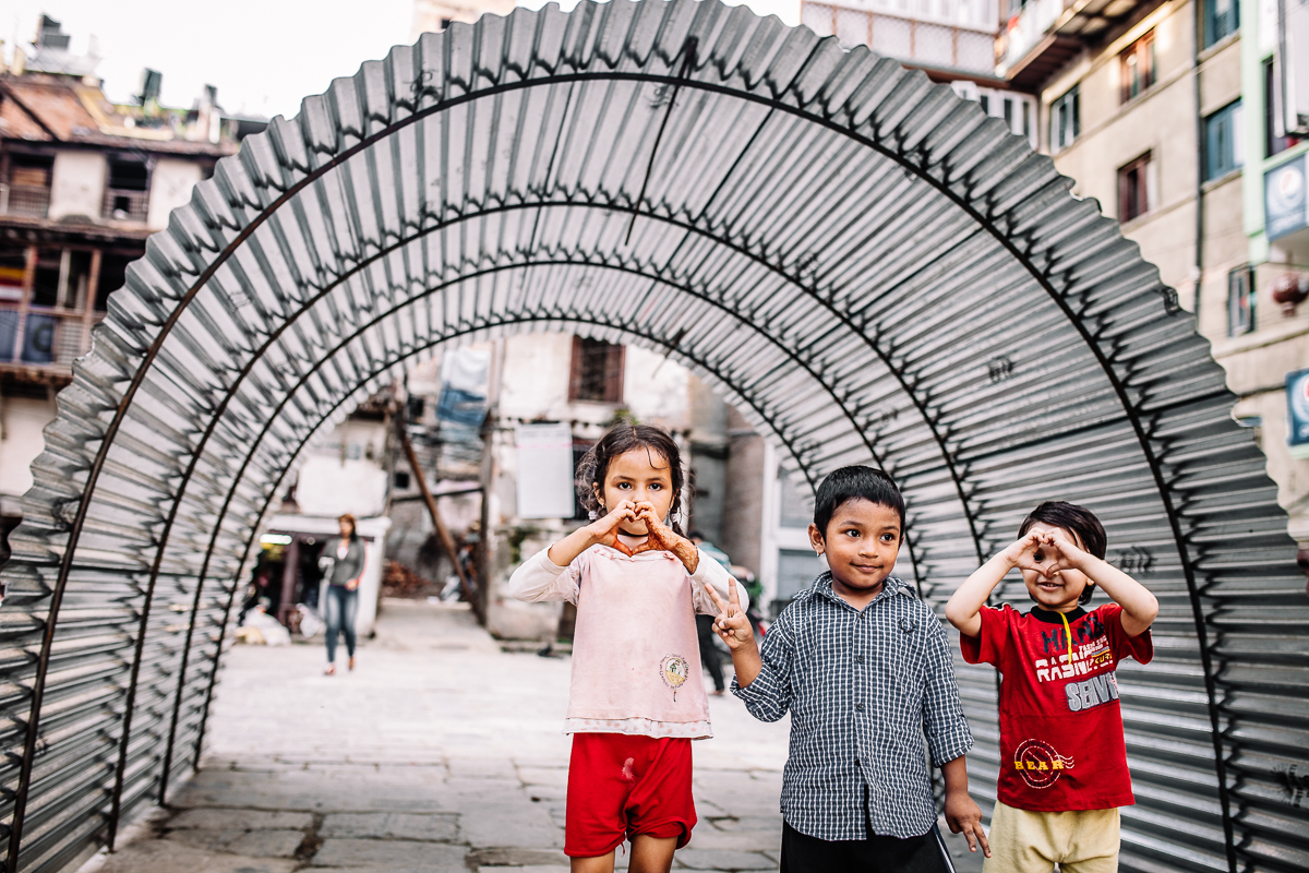 Children playing infront of a makeshift tent for those who have lost their homes. Bakhtapur, Nepal | 2015