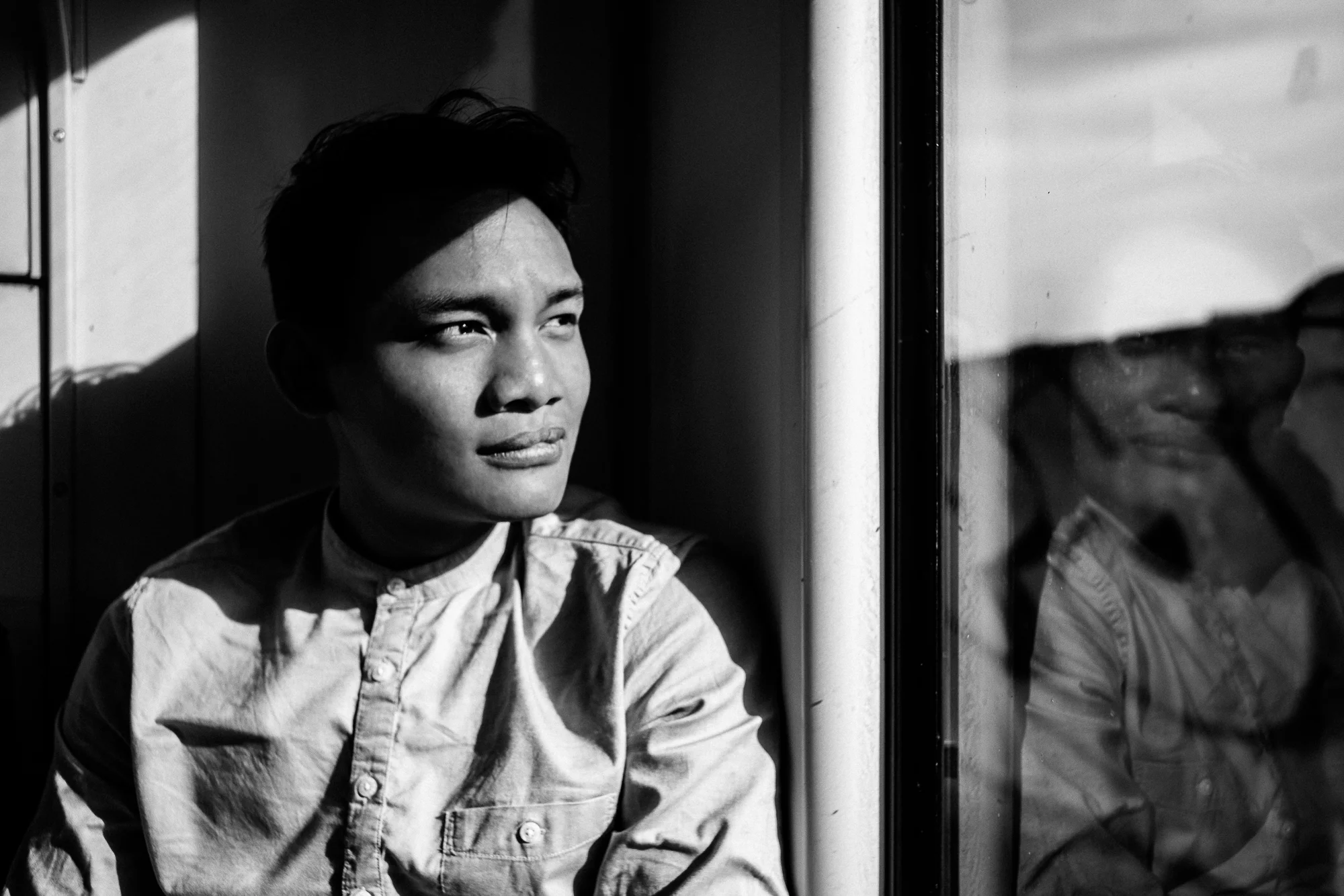 Arif Nurhakim When it comes to the tool in his hands, Hakim sees himself first as a story teller then secondly as a photographer. The camera is his pen and the photograph is his empty canvas. Humbled by life experiences, he is a faithful lost believer in the play of world politics today. Telling the untold and showing the unseen have ever since become his mantra in capturing photos. This will hopefully be able to shed some light on the present day human conditions that he continues to observe and document. Having developed an eye for street photography over six years and a keen interest in documentary/reportage, Hakim tries to blend in both styles together in his visual story telling. When he is not scouting for stories, he roams the surface of the earth for new adventures. CONTACT DETAILS: For photography assignments, prints and further enquiries, you can reach him at: arifnurhakim.91@gmail.com