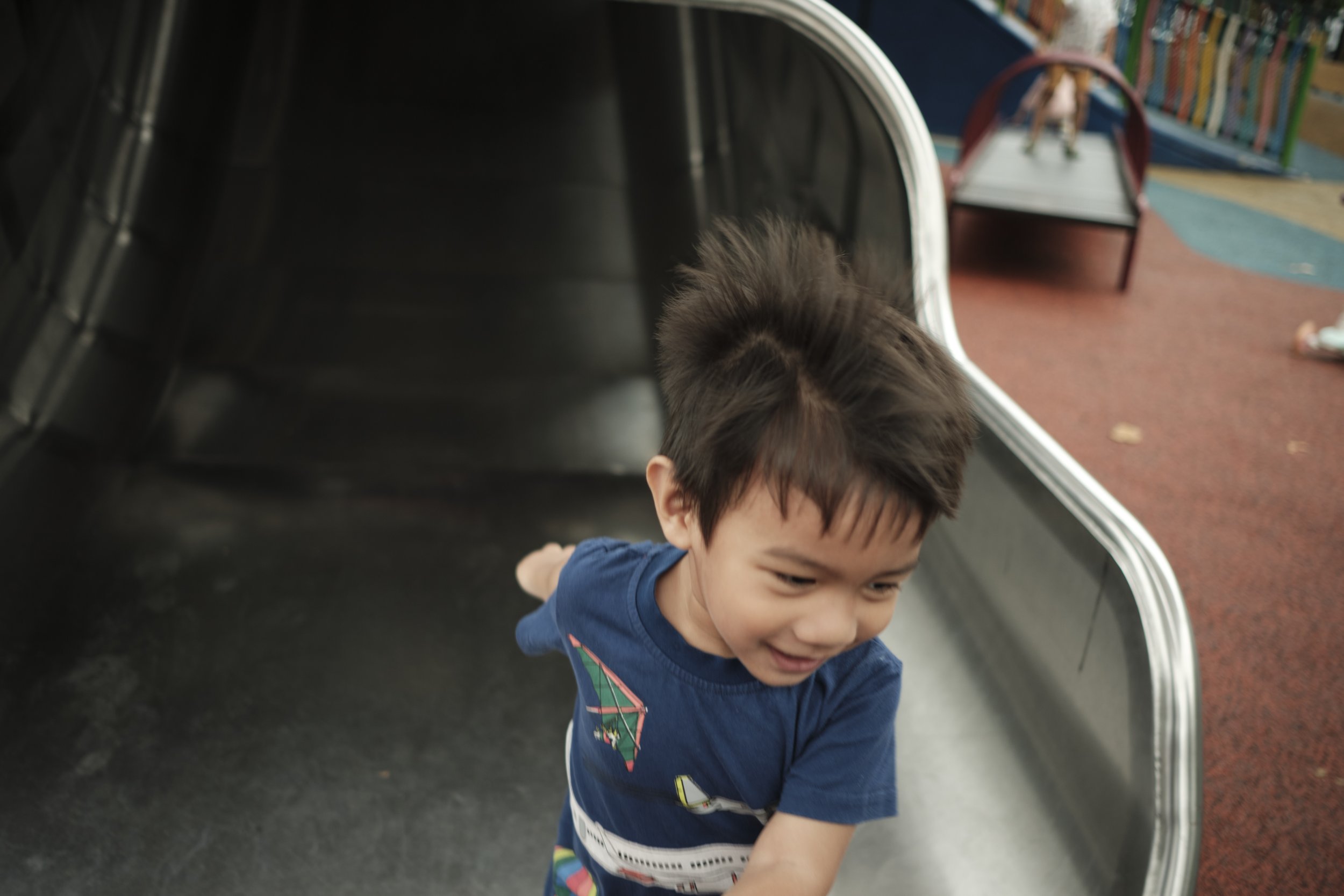  A child’s happiness can be captured in the 2 or 3 seconds he goes down a slide. 